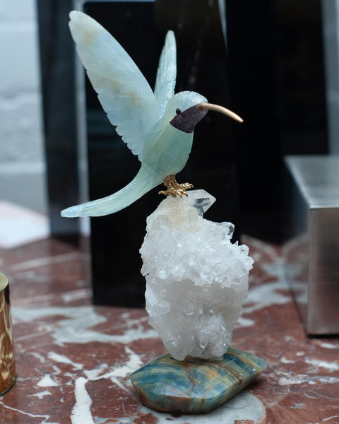 AQUAMARINE HUMMINGBIRD SCULPTURE ON ROCK CRYSTAL AND BLUE ONYX MINERAL BASE