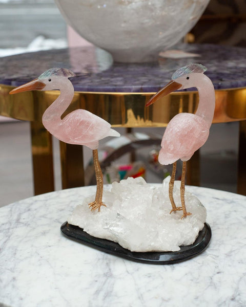 ROSE QUARTZ CRANE PAIR SCULPTURE ON ROCK CRYSTAL AND BLACK MARBLE MINERAL BASE