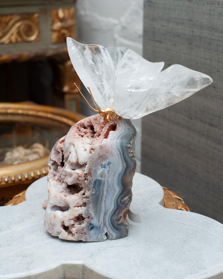 ROCK CRYSTAL BUTTERFLY SCULPTURE ON PINK AND GREY GEODE BASE