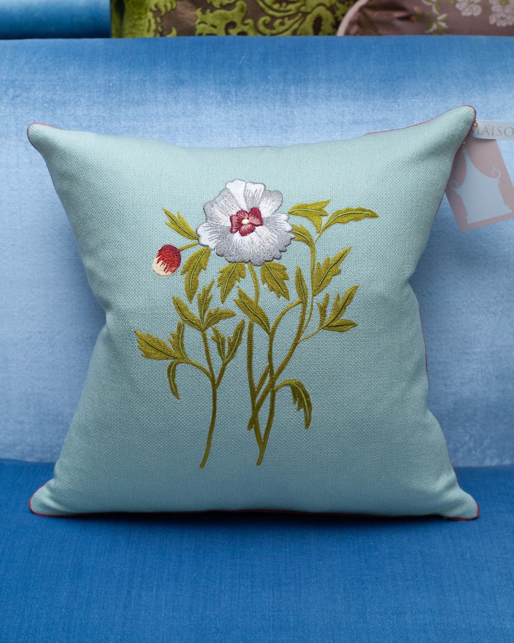 CONTEMPORARY SOFT BLUE MERINO WOOL AND LINEN PILLOW WITH EMBROIDERED FLOWER