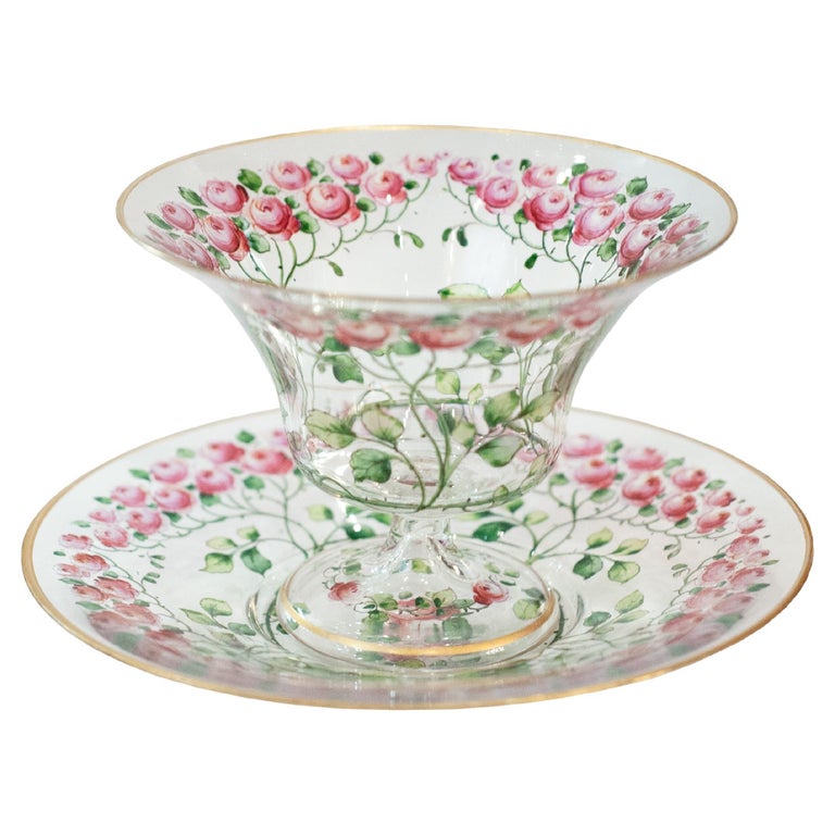 ANTIQUE BOHEMIAN FOOTED BOWL AND UNDERPLATE WITH GILDED RIMS AND ROSE FLORALS