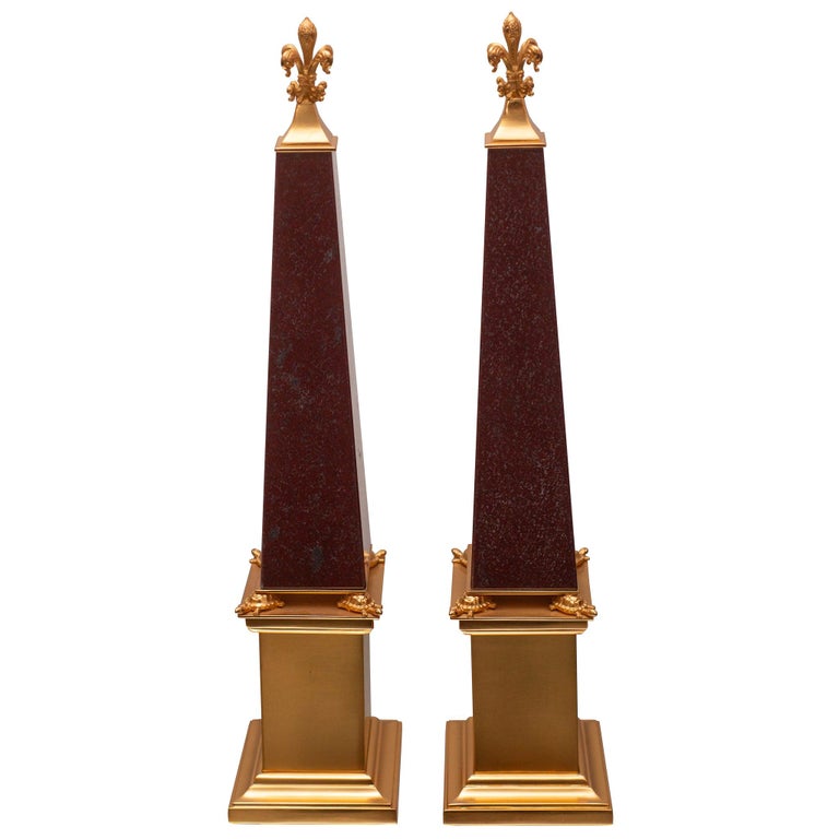 CONTEMPORARY PAIR OF BRONZE & RED MARBLE OBELISKS