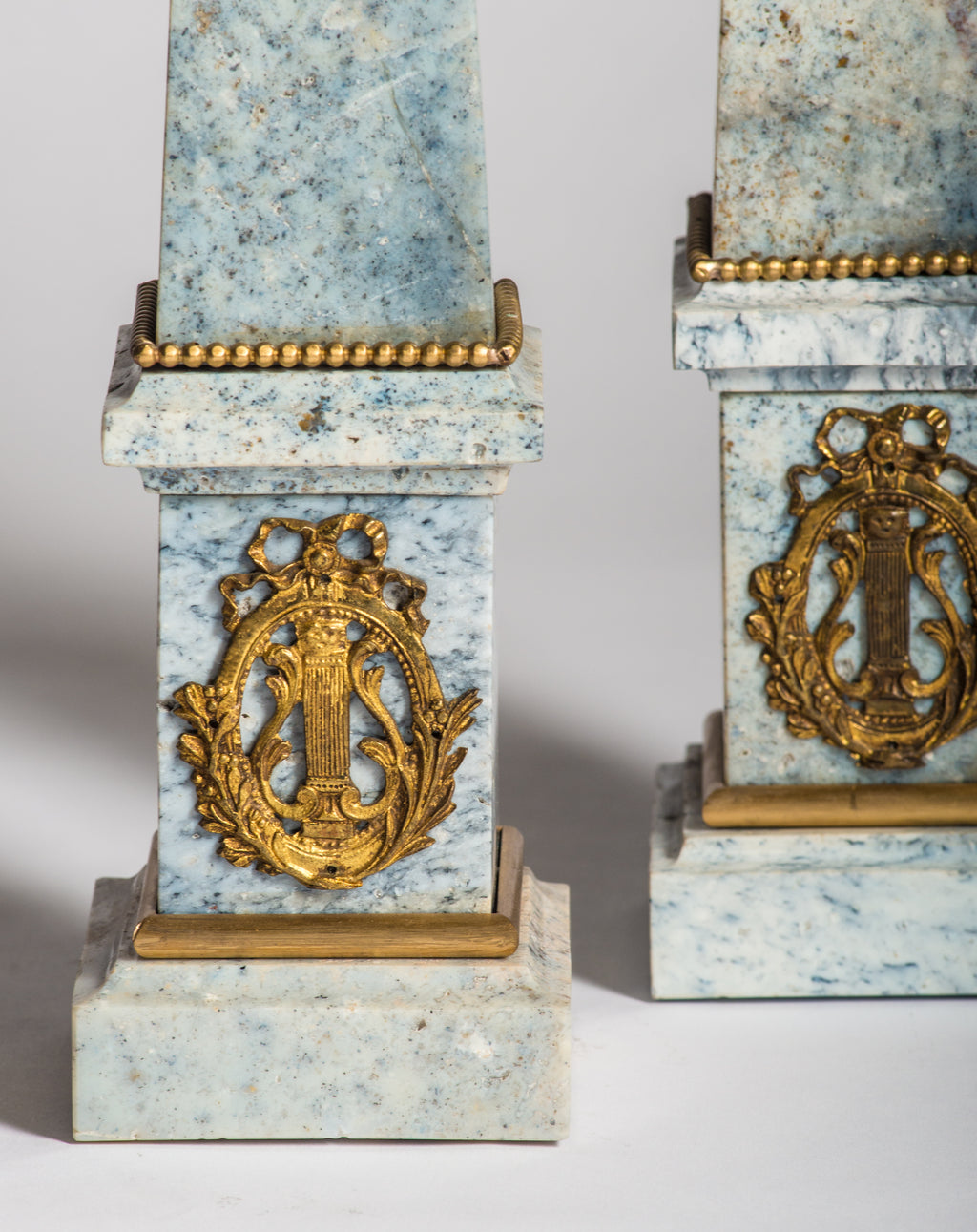  A pair of magnificent Antique French Empire blue Jasper obelisks with original ormolu.