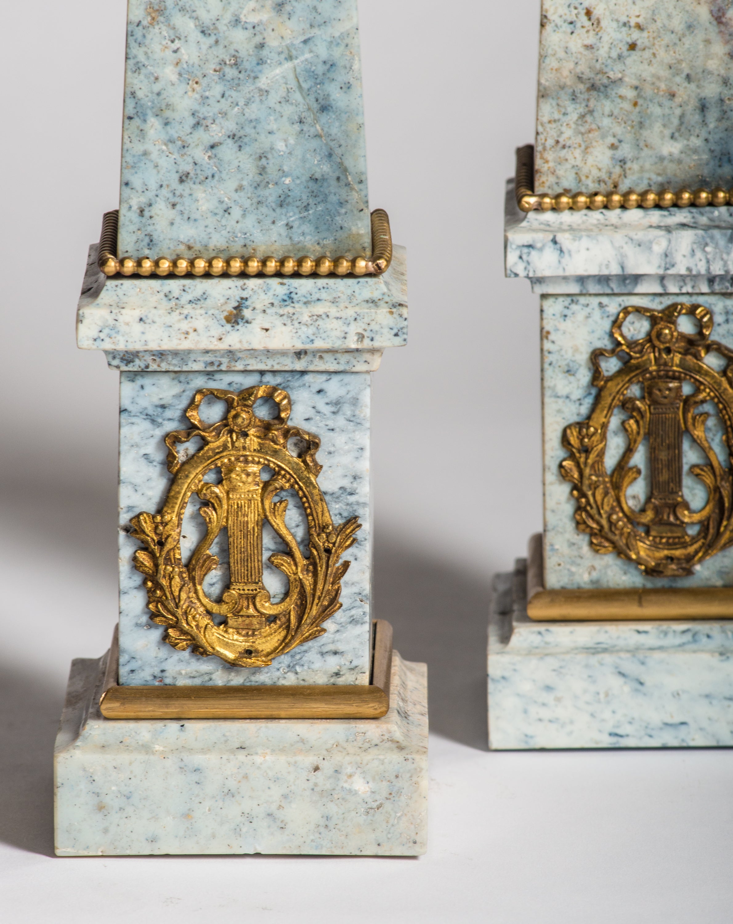  A pair of magnificent Antique French Empire blue Jasper obelisks with original ormolu.