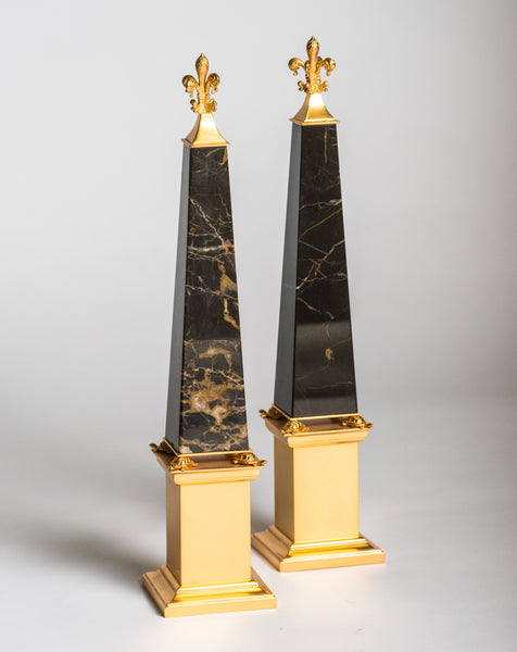 A pair of bronze & St. Laurent marble obelisks embellished with tortoises made by a master bronze maker in Florence. Nurit visited and met with this artisan in his studio. Sold as a pair.