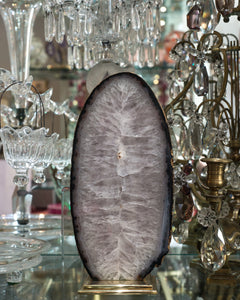 The natural beauty of this large agate slice is elevated with a custom Studio Maison Nurita brass base.