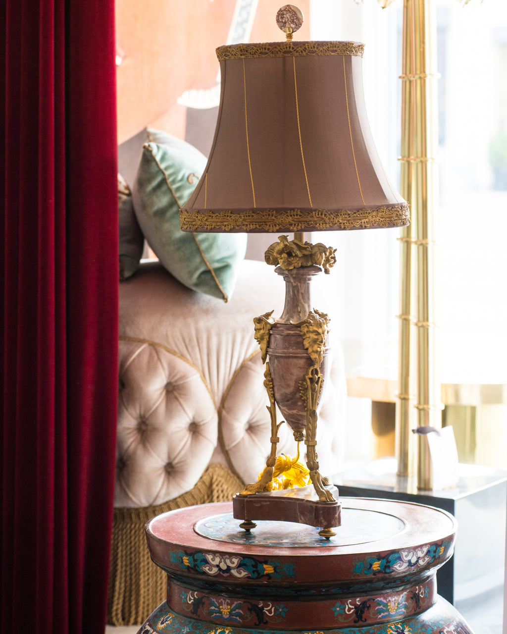 At Maison Nurita we always try to source the most unusual and rarest of antique lamps. The marble and bronze work on this pair of Antique French lamps is beautiful. These lamps have been carefully rewired and finished with a handmade custom silk taffeta shade with metallic trim. Sold as a pair.