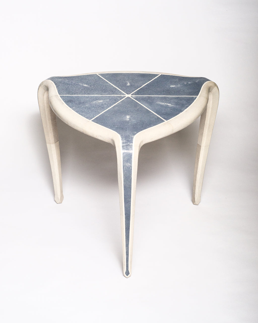 Maison Nurita is a destination for the most unusual and rare items for your home. This Tripod Table is crafted of a sycamore wood frame and completely covered in  navy blue and pale grey Shagreen and inlaid with bone. Our tables are custom designed. Instead of traditional neutrals, Maison Nurita offers Shagreen furniture in a palette of unique colours.