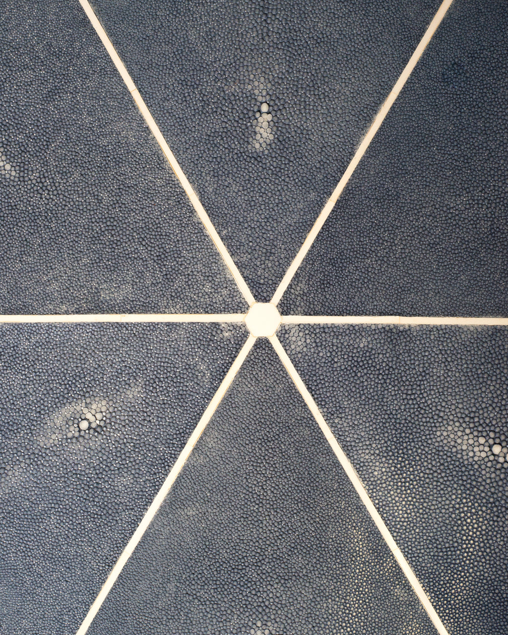 Maison Nurita is a destination for the most unusual and rare items for your home. This Tripod Table is crafted of a sycamore wood frame and completely covered in  navy blue and pale grey Shagreen and inlaid with bone. Our tables are custom designed. Instead of traditional neutrals, Maison Nurita offers Shagreen furniture in a palette of unique colours.