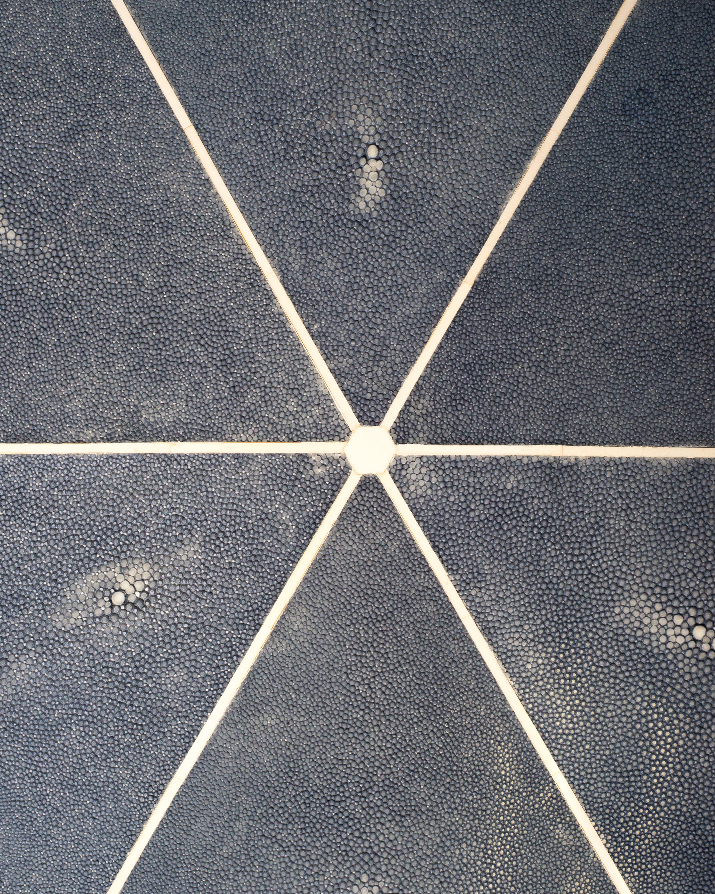 Maison Nurita is a destination for the most unusual and rare items for your home. This Tripod Table is crafted of a sycamore wood frame and completely covered in  navy blue and pale grey Shagreen and inlaid with bone. Our tables are custom designed. Instead of traditional neutrals, Maison Nurita offers Shagreen furniture in a palette of unique colours.