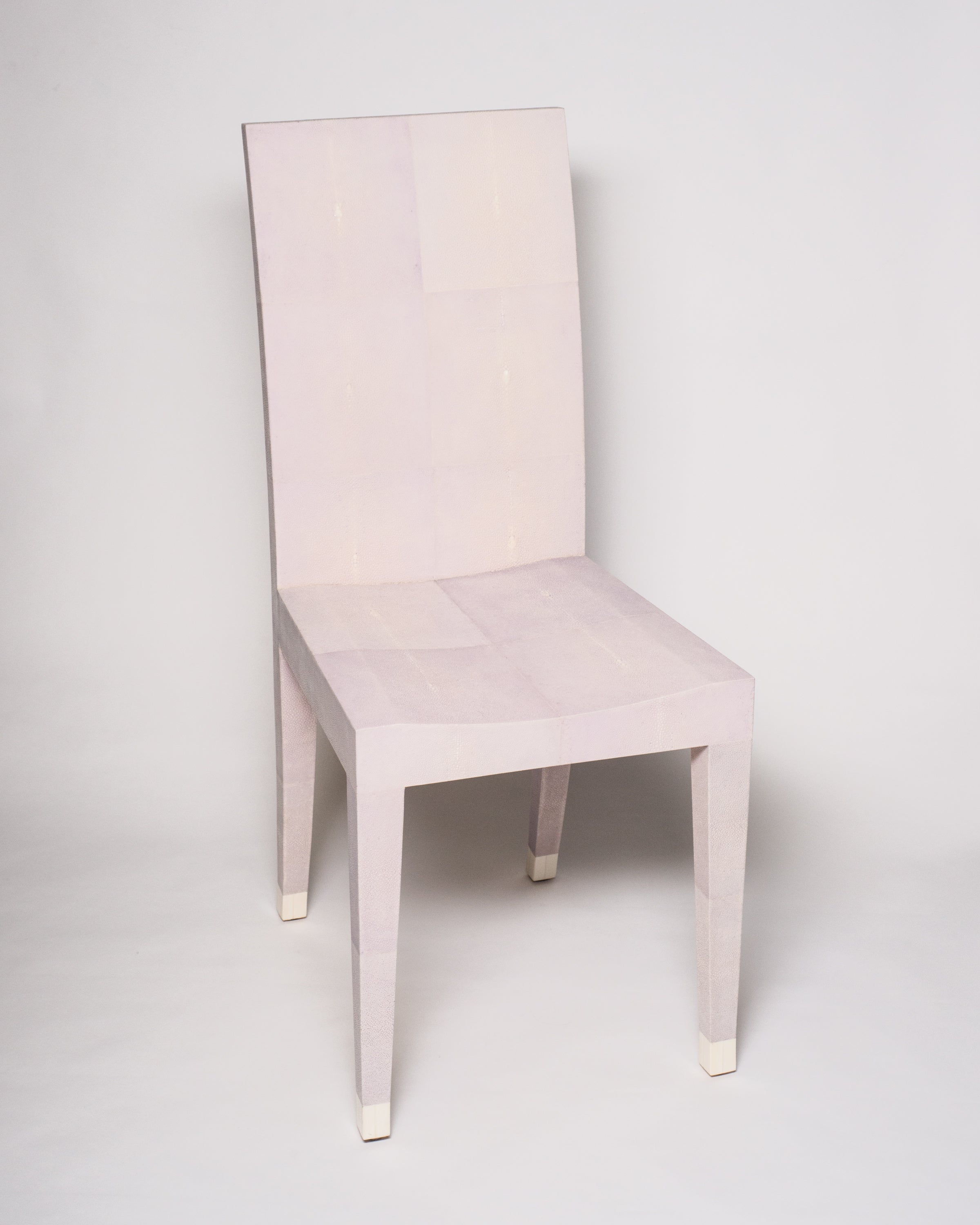 This Shagreen Chair was designed by Nurit for her own personal office. The refined tapered leg is capped with a bone toe. Working with the vendor in Asia, Nurit selected this particular shade of pale lavender. This elegant yet modern chair is well suited for a bathroom, a woman’s vanity or a desk. Maison Nurita invites you to take a seat.