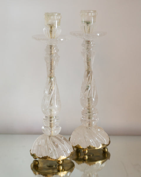 A pair of carved Rock Crystal candlesticks each on a brass base, sourced by Nurit on a trip to Paris. A modern "twist" on the traditional candlesticks.