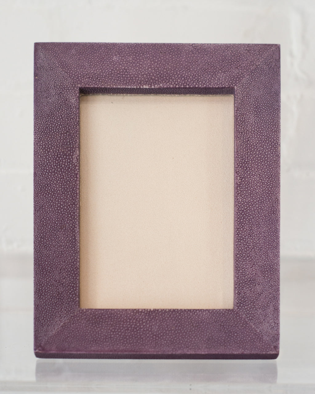 A small picture frame in lavender Shagreen & walnut, backed in suede.