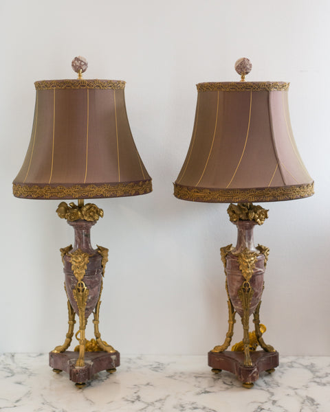 At Maison Nurita we always try to source the most unusual and rarest of antique lamps. The marble and bronze work on this pair of Antique French lamps is beautiful. These lamps have been carefully rewired and finished with a handmade custom silk taffeta shade with metallic trim. Sold as a pair.