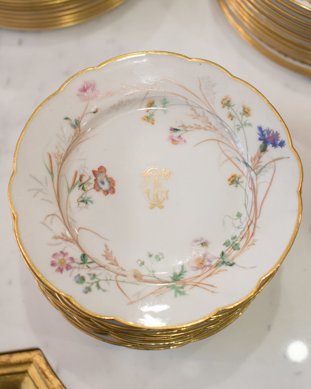 ANTIQUE SET OF 12 FRENCH DISHES WITH A SCALLOPED EDGE