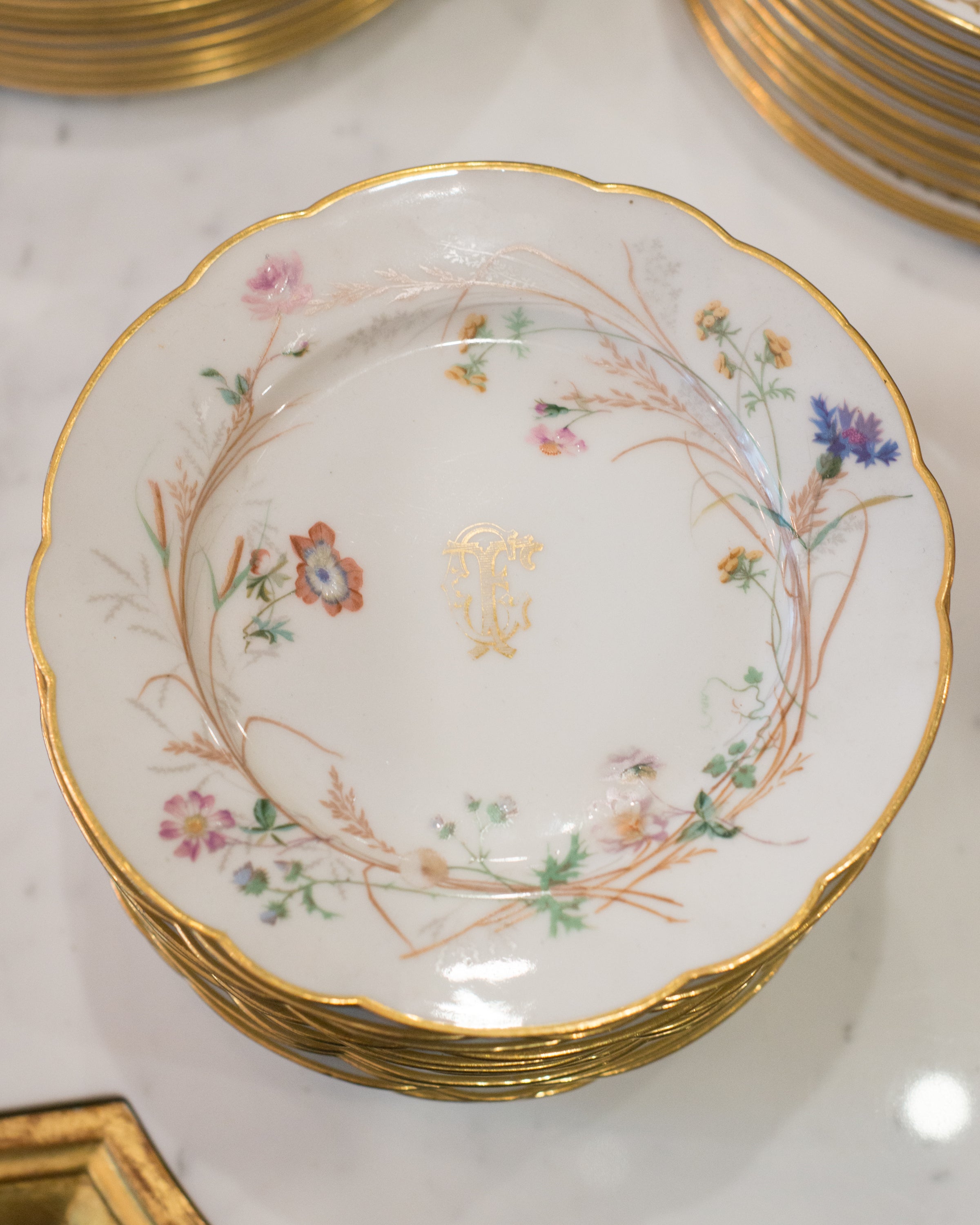 ANTIQUE SET OF 12 FRENCH DISHES WITH A SCALLOPED EDGE