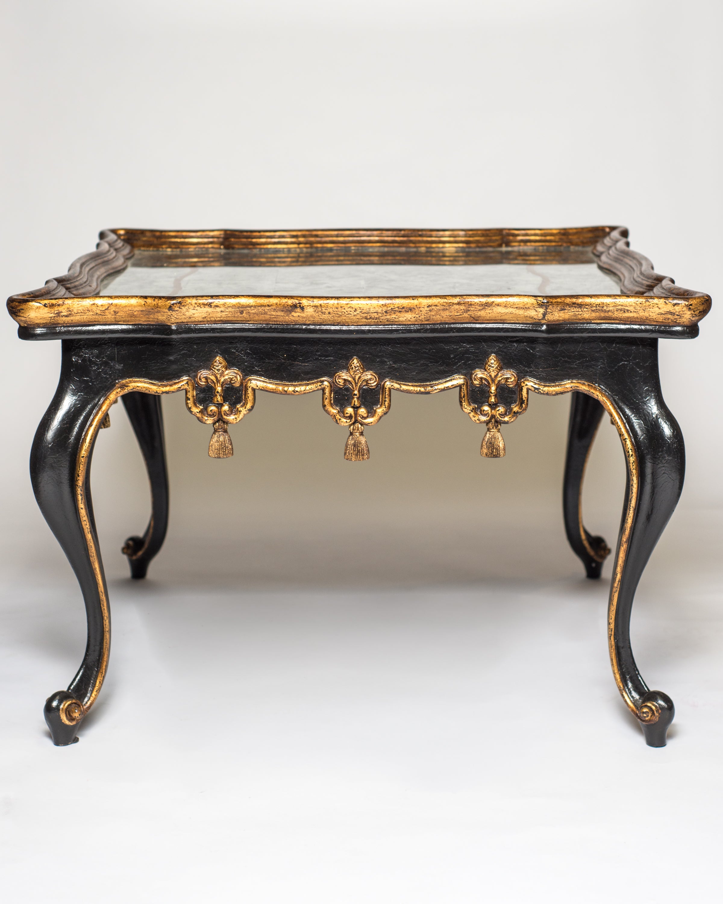 PAIR OF BLACK & GILDED COFFEE TABLES WITH EGLOMISE TOPS
