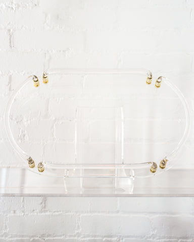 CONTEMPORARY ACRYLIC OVAL TRAY WITH BRASS DETAILS