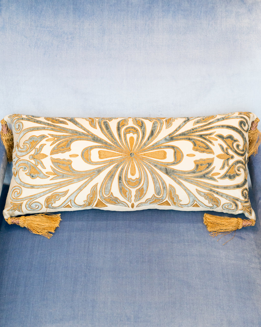 GOLD & BLUE VELVET PILLOW ON CRÈME SILK WITH TASSELS