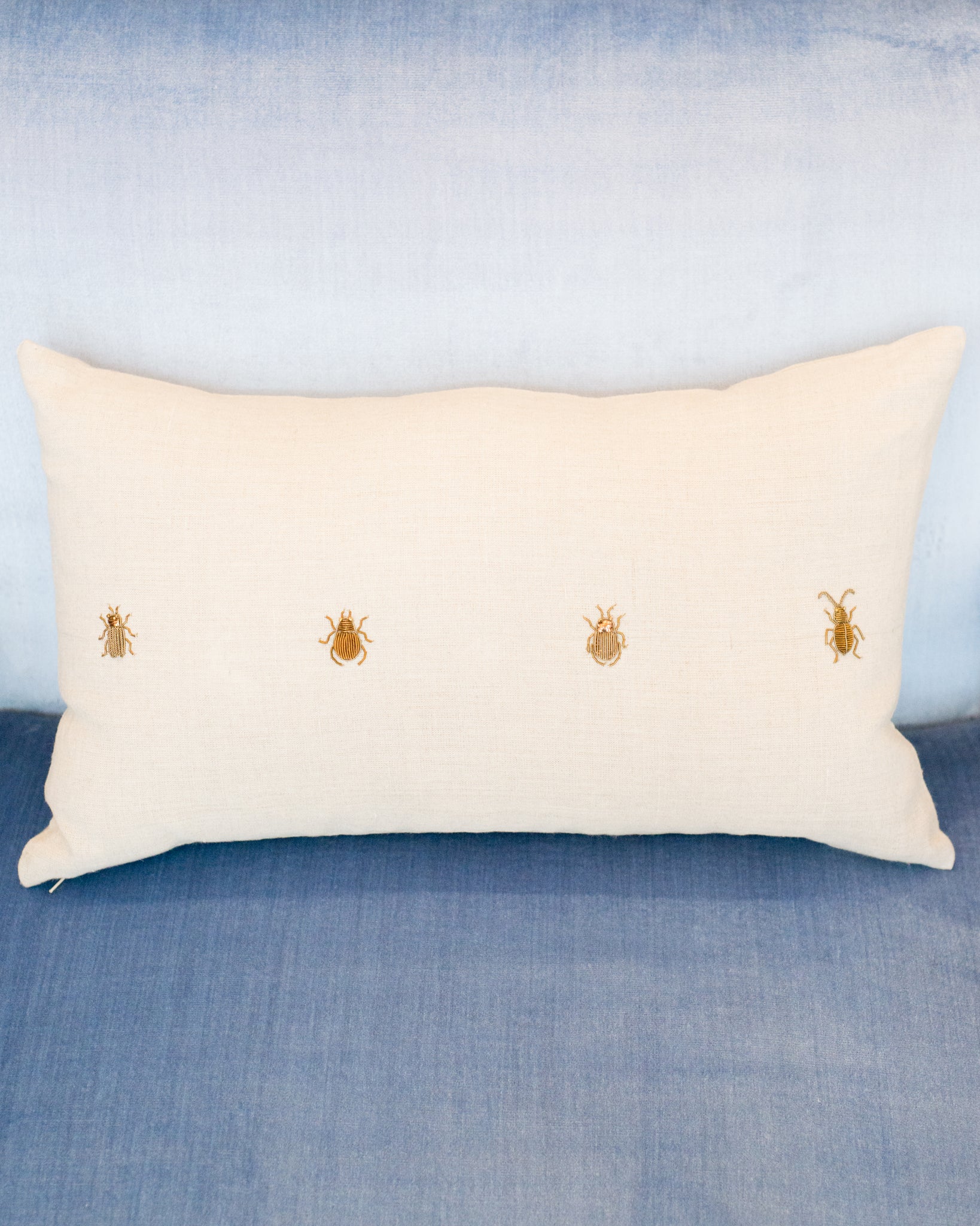 4 INSECTS ON A LINEN PILLOW
