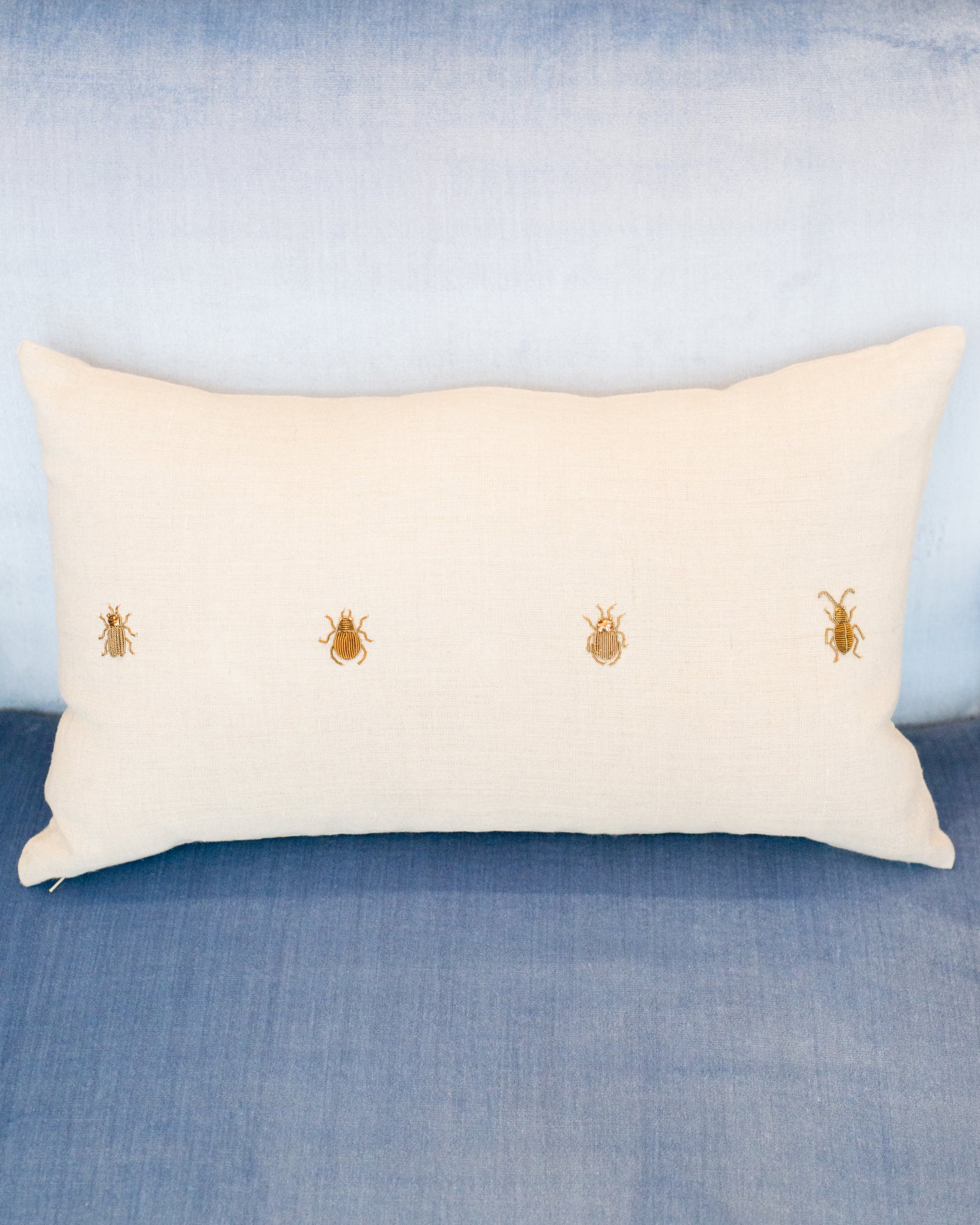 4 INSECTS ON A LINEN PILLOW