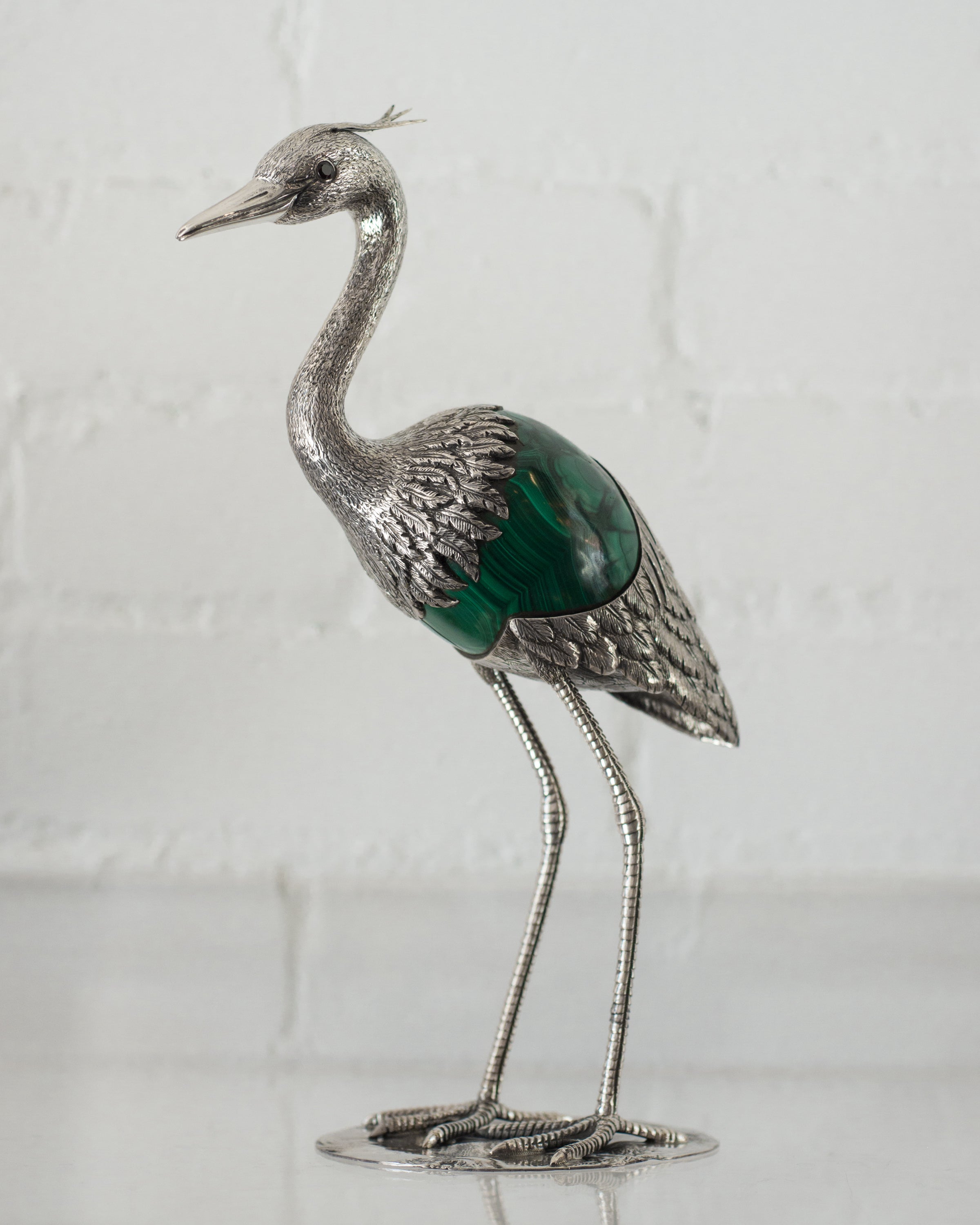 A 925 Sterling Silver heron with a Malachite egg by master Jeweler Alcino. Porto.