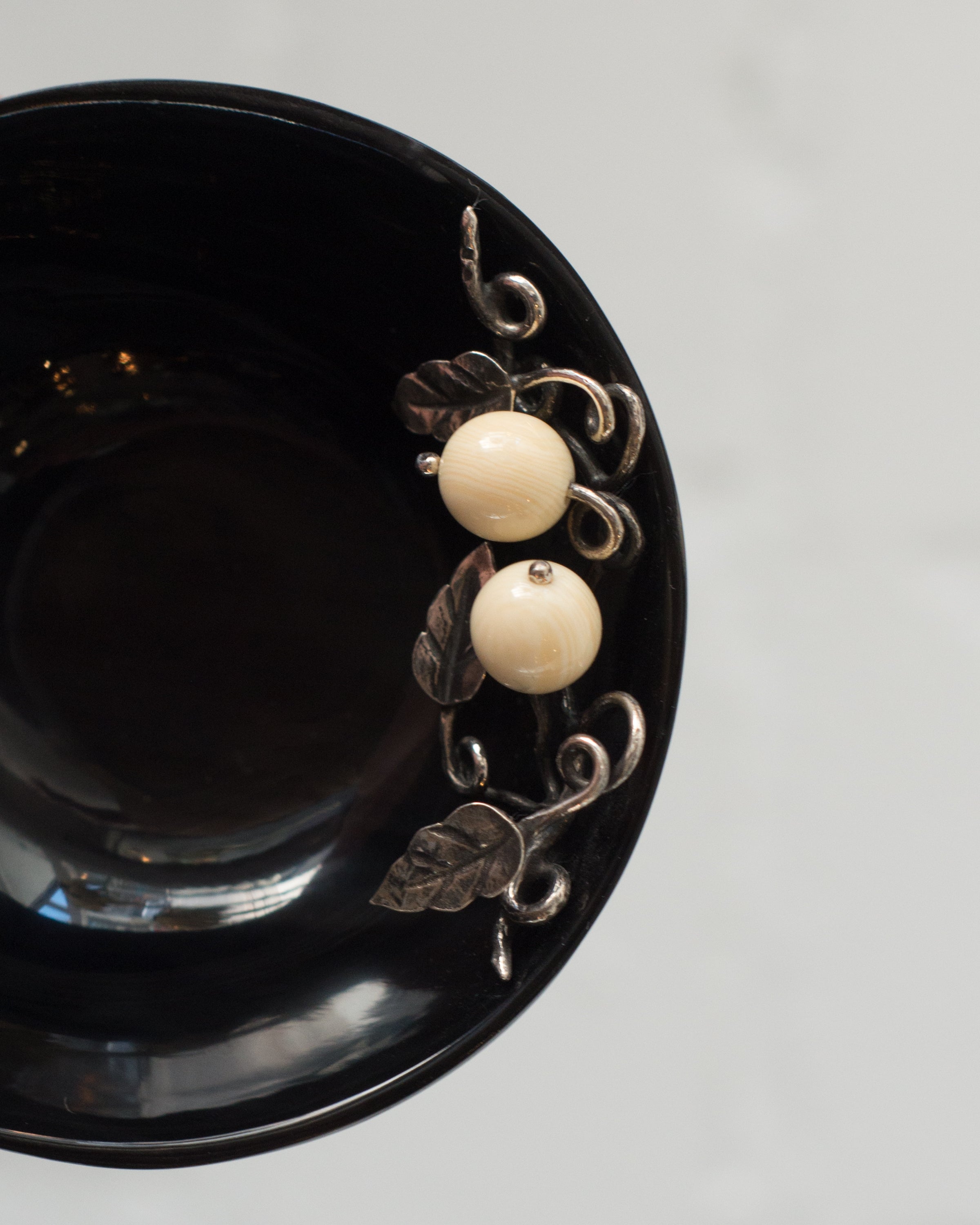 PAIR OF BLACK HORN BOWLS WITH 925 STERLING SILVER LEAFS AND WHITE AGATE BERRIES