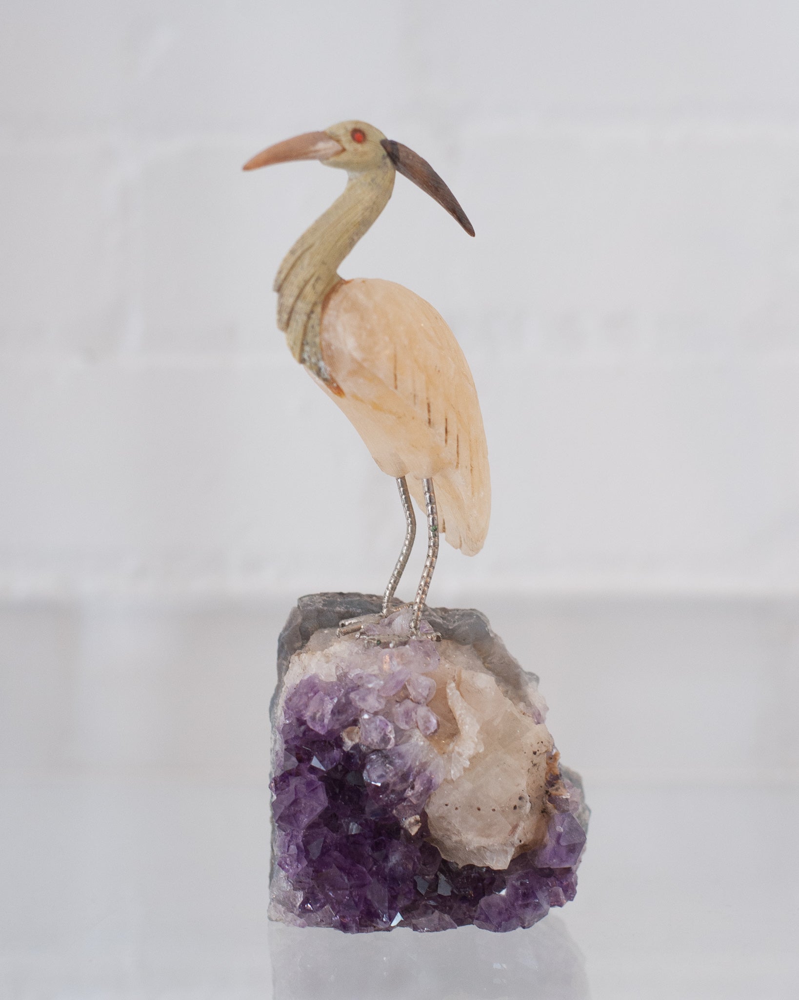 CONTEMPORARY SEMI PRECIOUS CRANE ON AN AMETHYST BASE