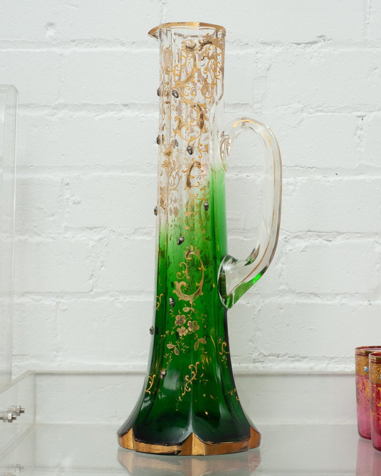 ANTIQUE MOSER CLEAR TO GREEN EWER / PITCHER WITH GILDING AND ACORNS