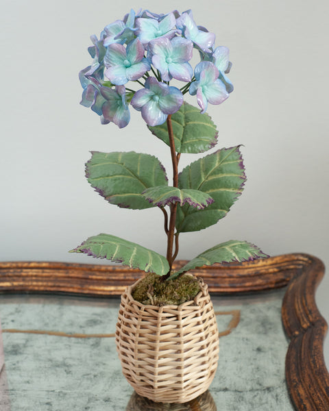 PORCELAIN GLAZED PURPLE AND BLUE HYDRANGEA IN A WICKER POT