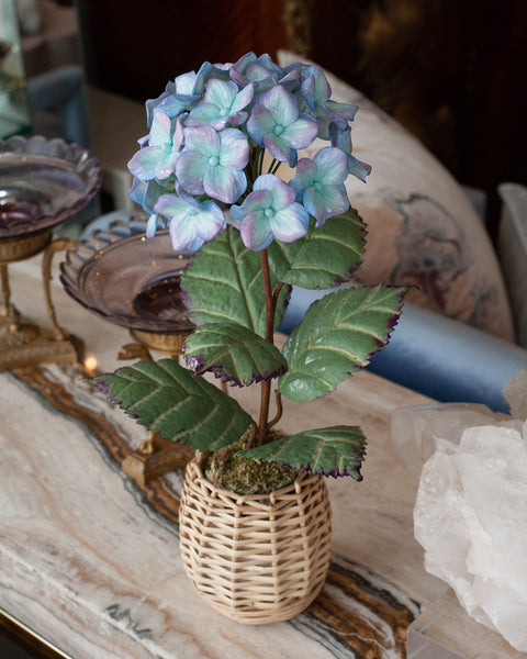 PORCELAIN GLAZED PURPLE AND BLUE HYDRANGEA IN A WICKER POT