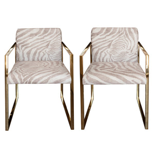 PAIR OF CONTEMPORARY POLISHED BRASS AND ZEBRA-PRINT UPHOLSTERED ARMCHAIRS