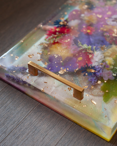 CONTEMPORARY ACRYLIC SERVING TRAY WITH SILK FLOWERS, GOLD LEAF AND GOLD HANDLES