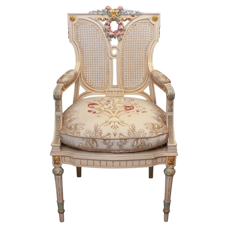 ANTIQUE FRENCH HANDPAINTED CHAIR WITH CANE WEBBING AND BROCADE FABRIC
