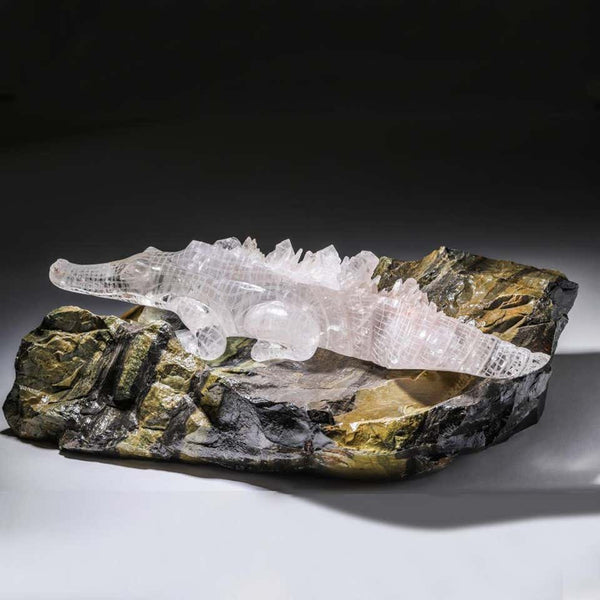 CONTEMPORARY LARGE HARD CARVED ROCK CRYSTAL ALLIGATOR ON SERPENTINE BASE