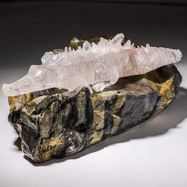 CONTEMPORARY LARGE HARD CARVED ROCK CRYSTAL ALLIGATOR ON SERPENTINE BASE